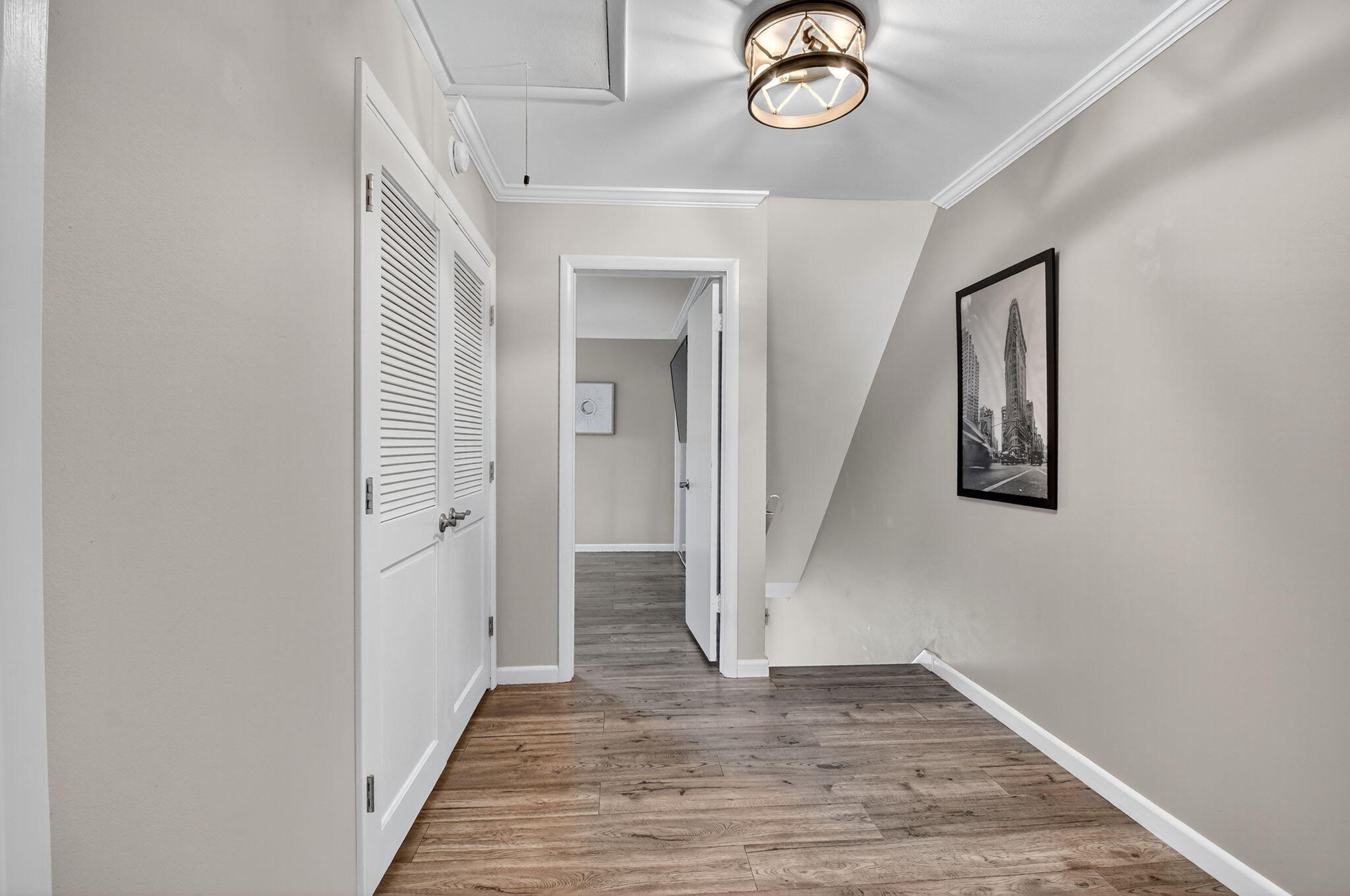 732 Rider Road Boynton Beach, FL 33435 - Photo 42 of 66 a view of a hallway with wooden floor