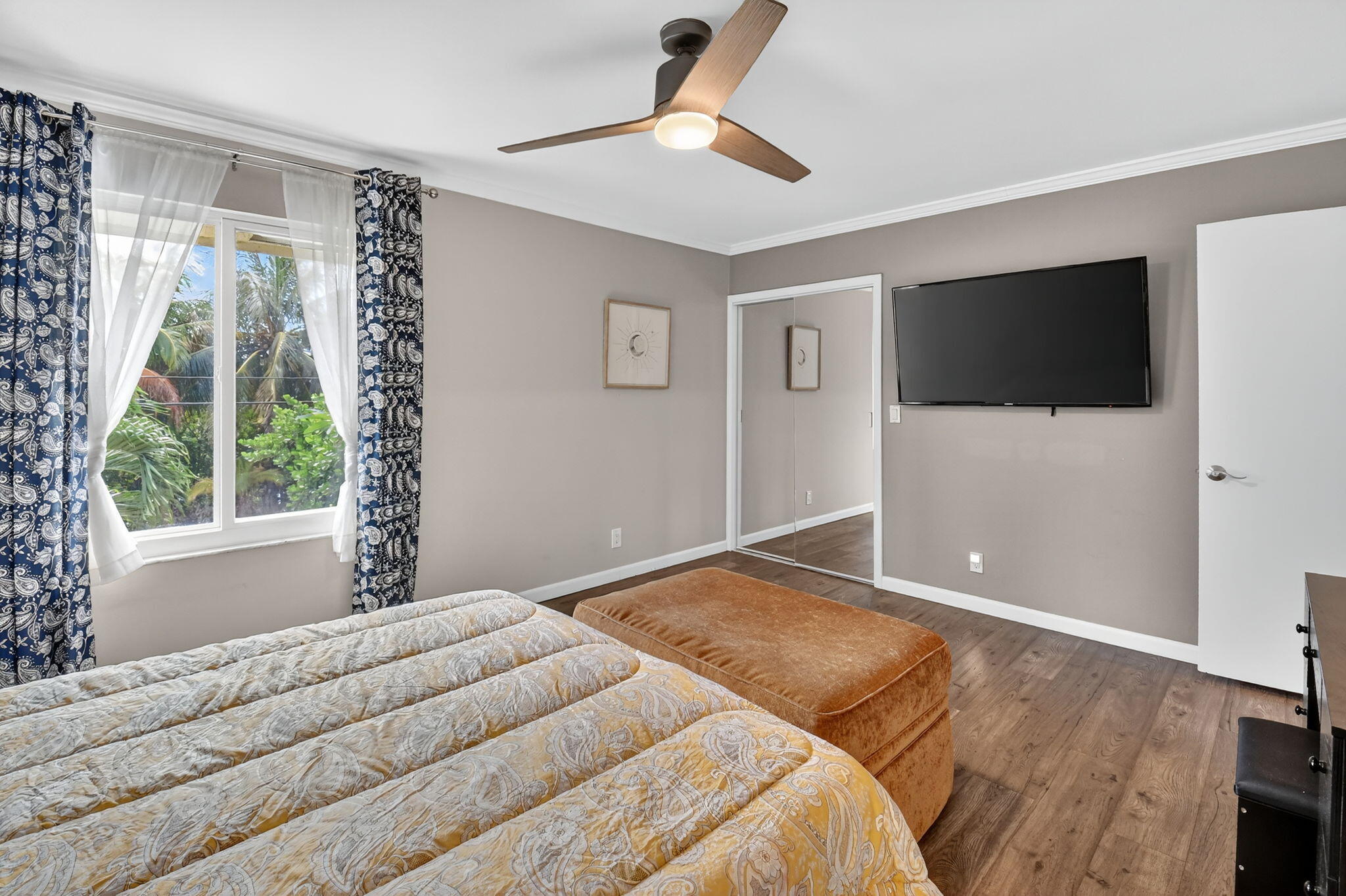 732 Rider Road Boynton Beach, FL 33435 - Photo 47 of 66 a bedroom with a bed and a flat screen tv