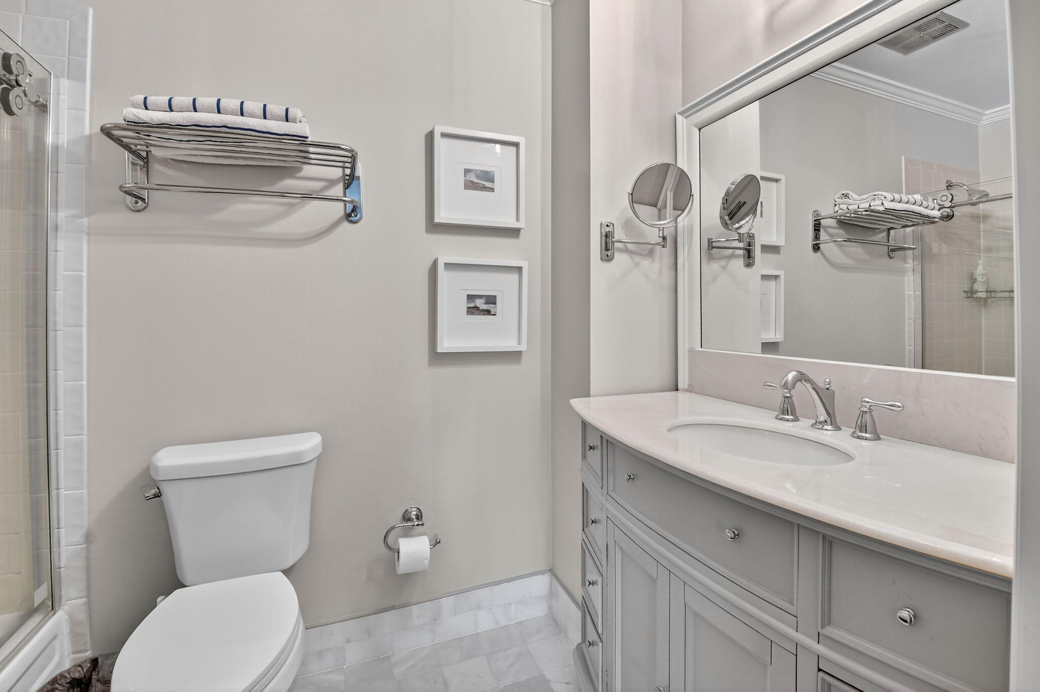 732 Rider Road Boynton Beach, FL 33435 - Photo 48 of 66 a bathroom with a toilet sink and mirror