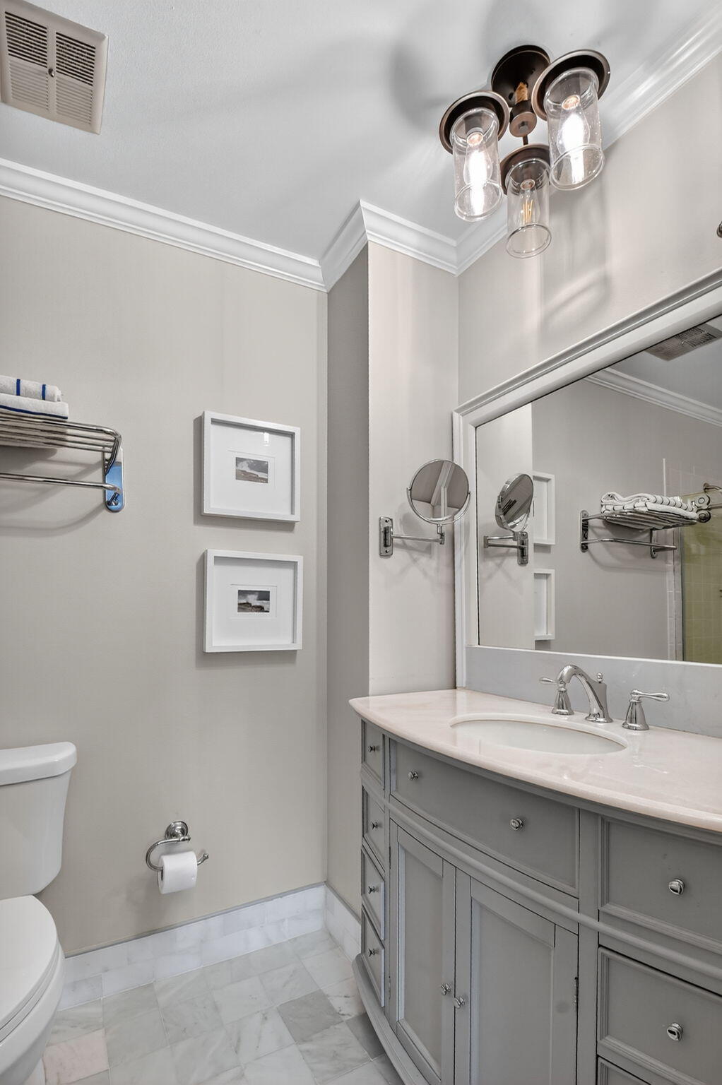 732 Rider Road Boynton Beach, FL 33435 - Photo 49 of 66 a bathroom with a sink a toilet and a mirror