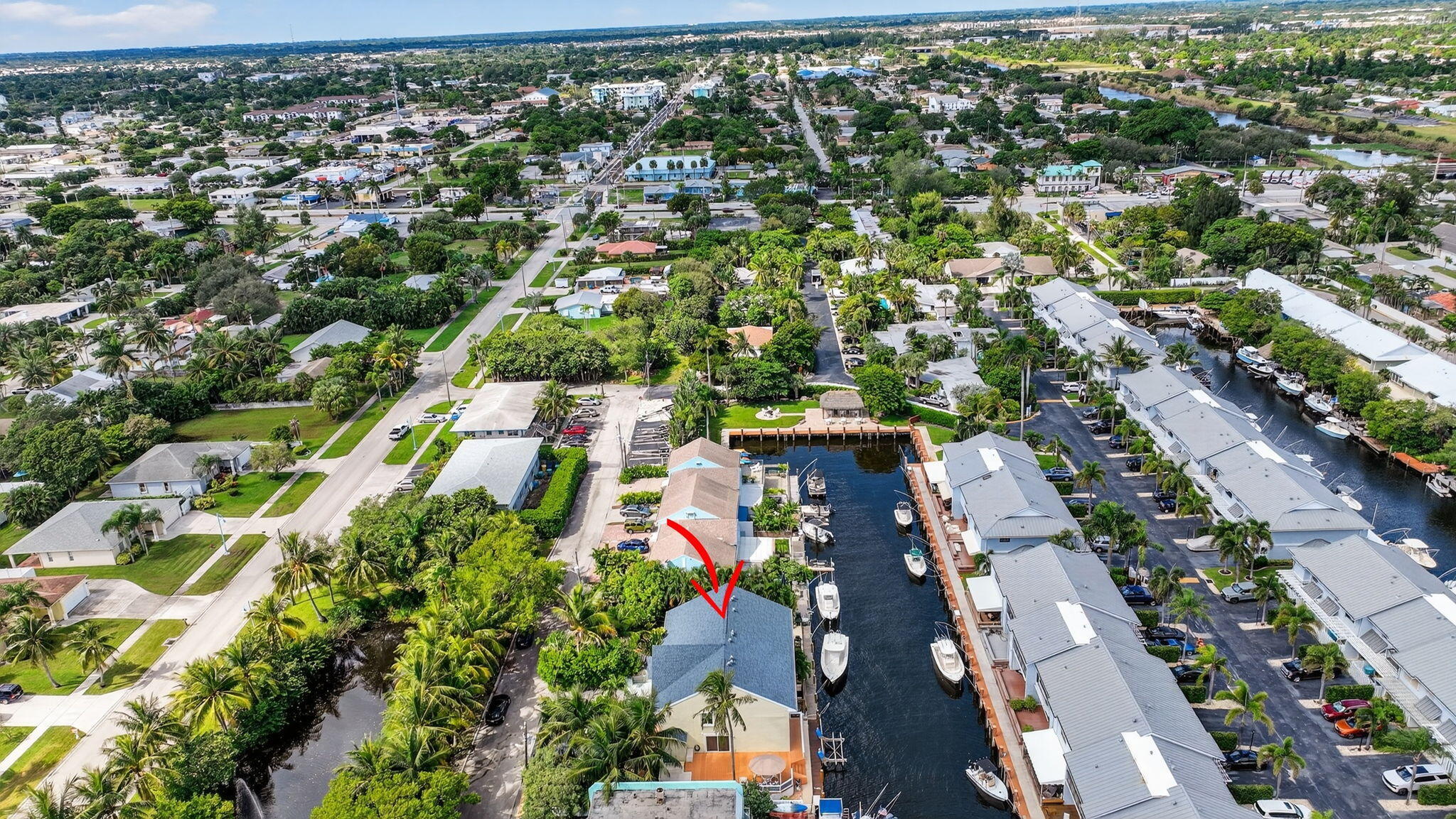 732 Rider Road Boynton Beach, FL 33435 - Photo 58 of 66 an aerial view of residential houses with outdoor space