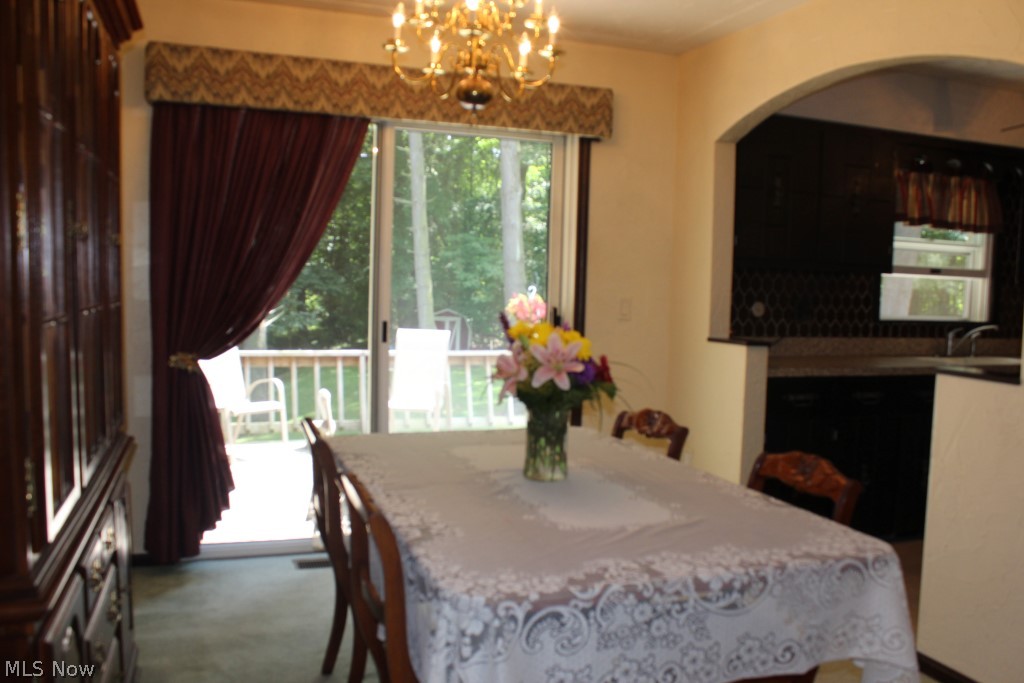 444 Stoner Road Clinton, OH 44216 - Photo 13 of 25 Dining room with slider to deck*