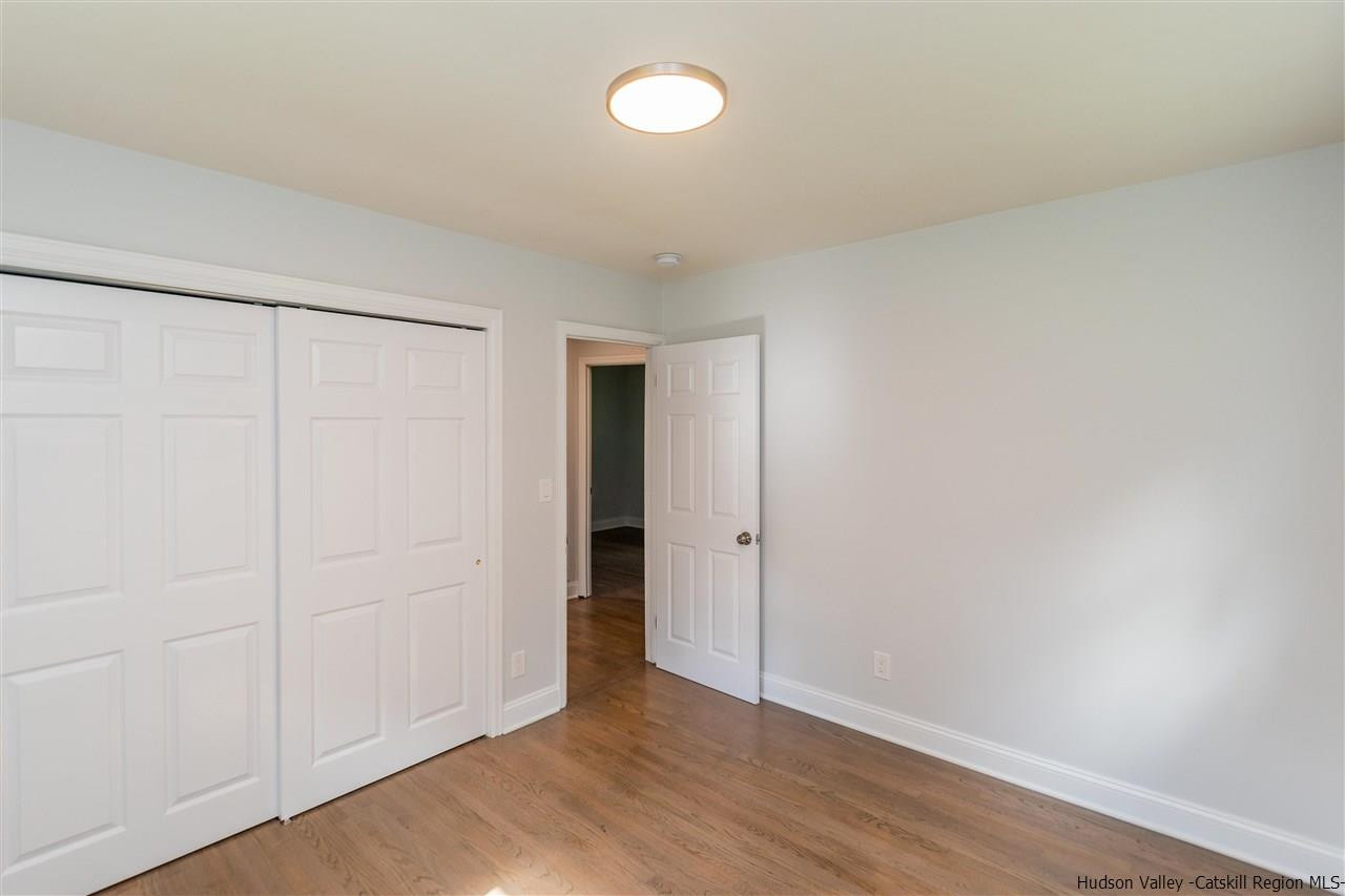 79 Kings Hill Road Walden, NY 12586 - Photo 14 of 35 a view of an empty room with wooden floor