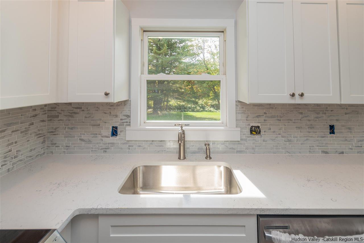 79 Kings Hill Road Walden, NY 12586 - Photo 5 of 35 a kitchen with a sink cabinets and window