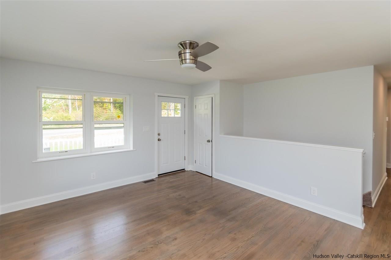 79 Kings Hill Road Walden, NY 12586 - Photo 8 of 35 wooden floor in an empty room with a window