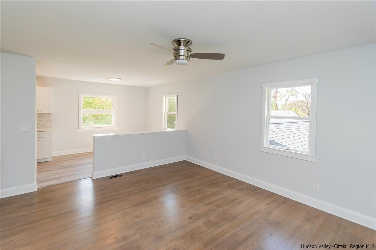 79 Kings Hill Road Walden, NY 12586 - Photo 10 of 35 wooden floor in an empty room with a window