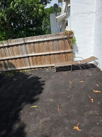 a view of a house with a street