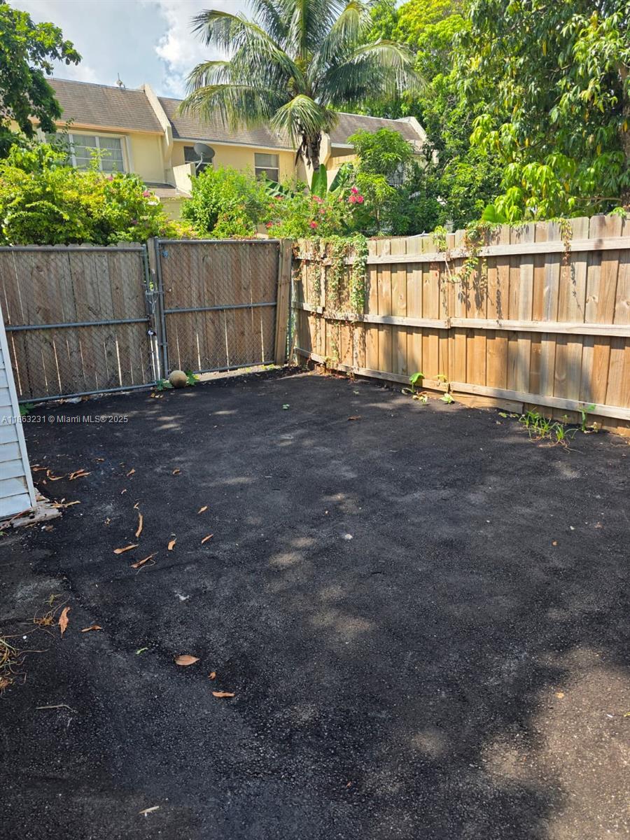 1206 Seaview, Unit 1206 North Lauderdale, FL 33068 - Photo 17 of 17 a view of backyard with green space