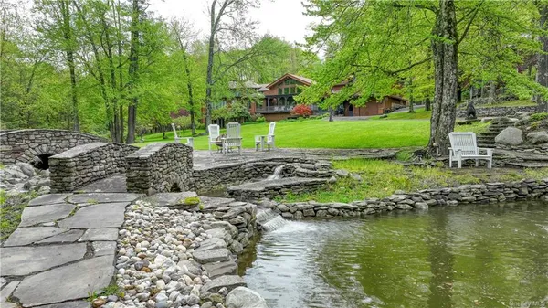 a view of a park with large trees