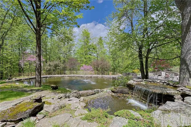 a view of a lake with a yard