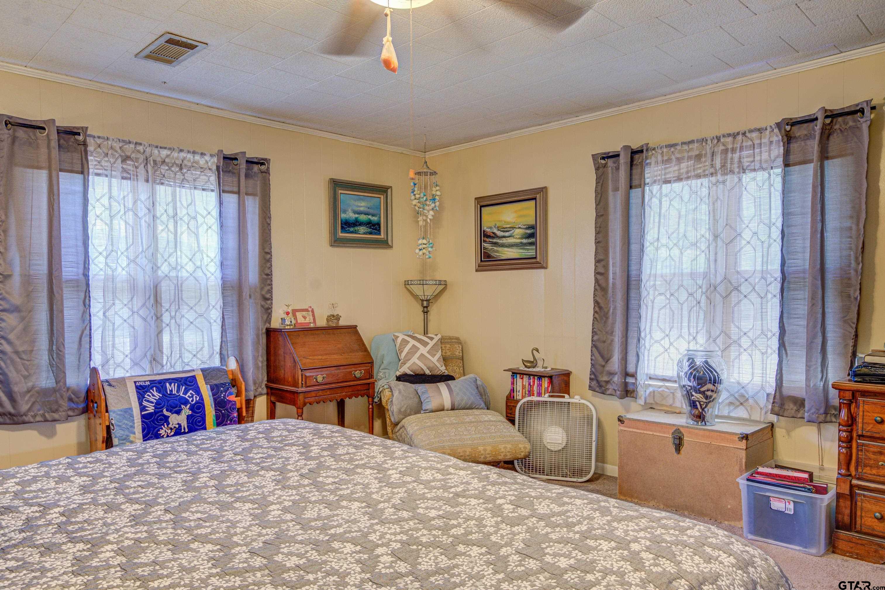 9315 Farm To Market Road 851 Rusk, TX 75785 - Photo 20 of 34 a bedroom with a bed and wooden floor