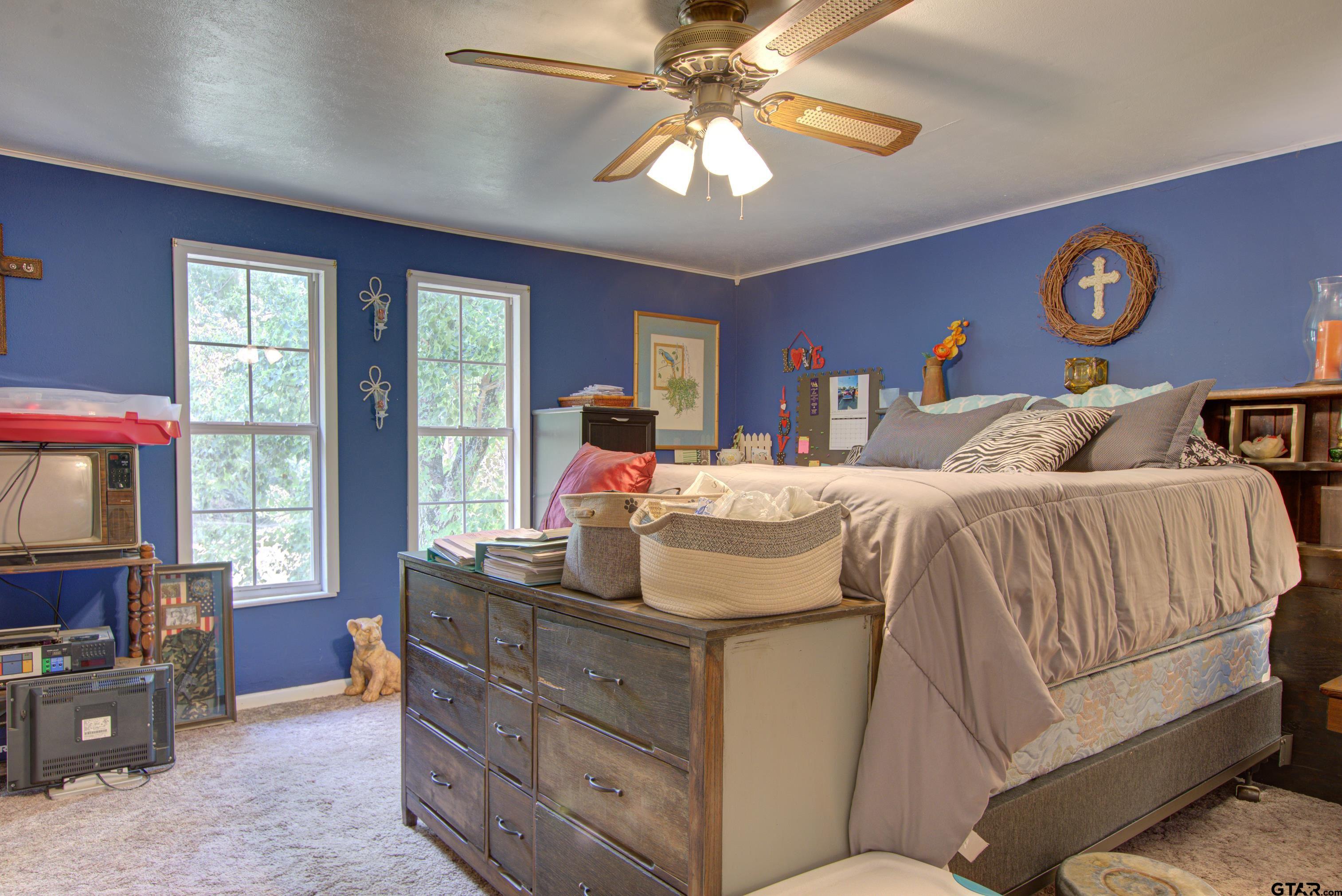 9315 Farm To Market Road 851 Rusk, TX 75785 - Photo 26 of 34 a living room with furniture and a flat screen tv
