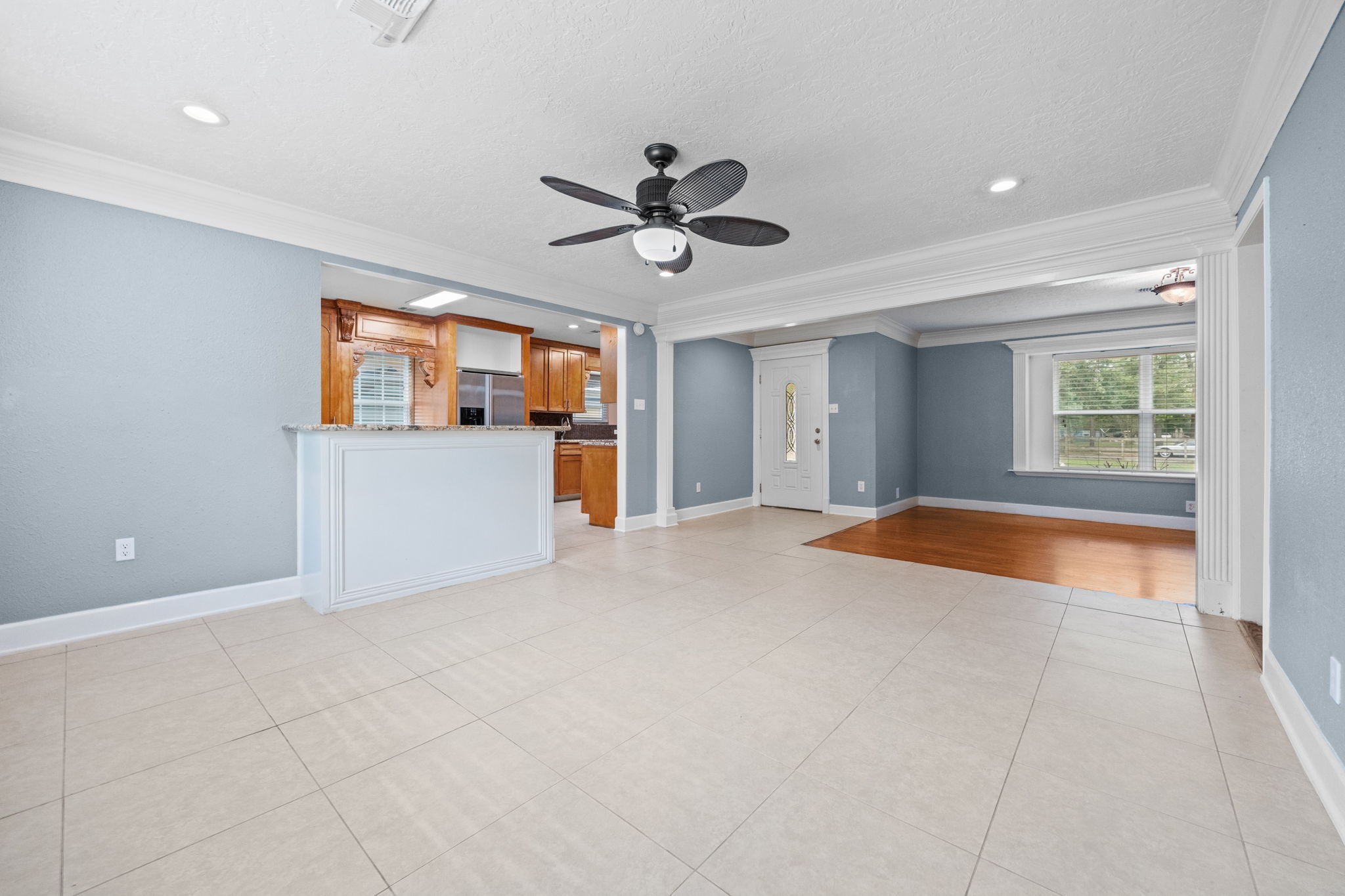 6742 Dusty Lane Conroe, TX 77306 - Photo 4 of 38 A view of the kitchen, dining and living room spaces