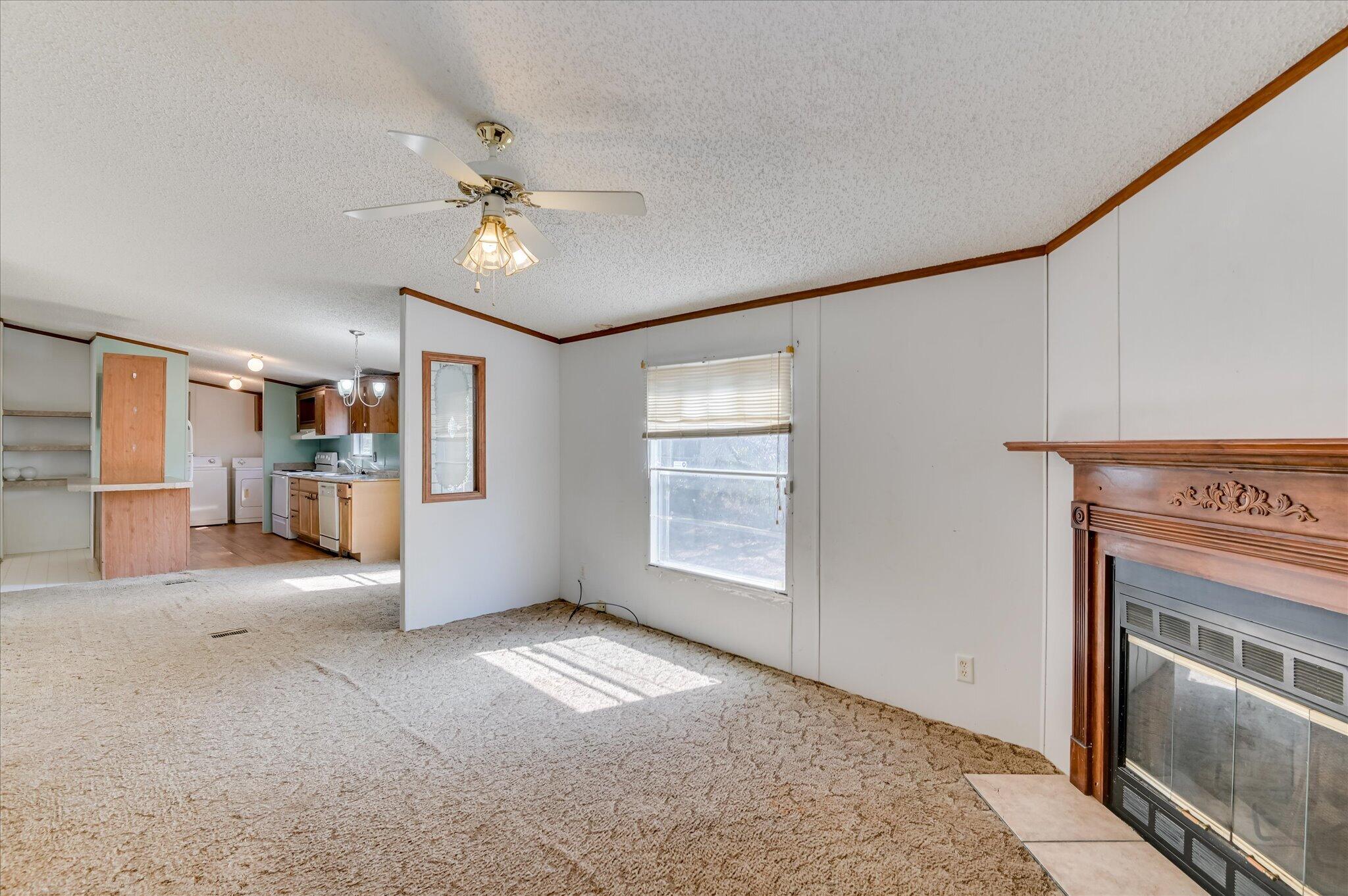 3440 Smith Road Blythe, GA 30805 - Photo 12 of 32 Family room looking towards kitchen and dining room