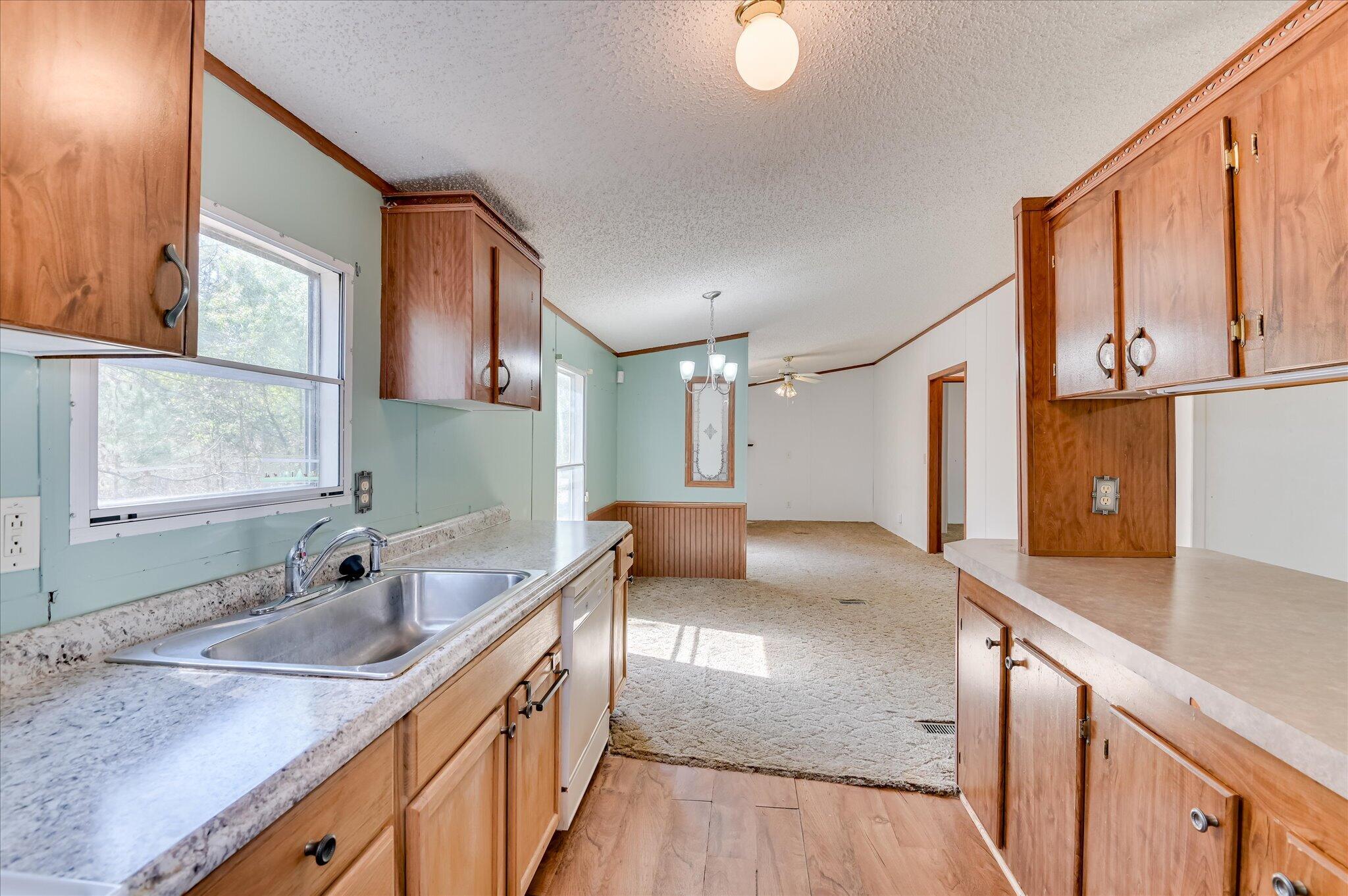 3440 Smith Road Blythe, GA 30805 - Photo 17 of 32 Kitchen with view of dining room and family room