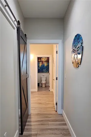 a living room with a sink and a mirror