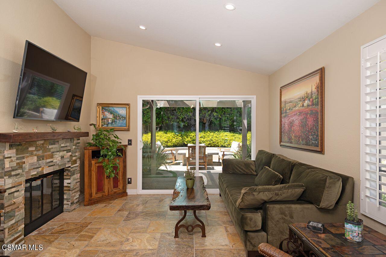 777 Congressional Road Simi Valley, CA 93065 - Photo 2 of 26 a living room with furniture and a flat screen tv