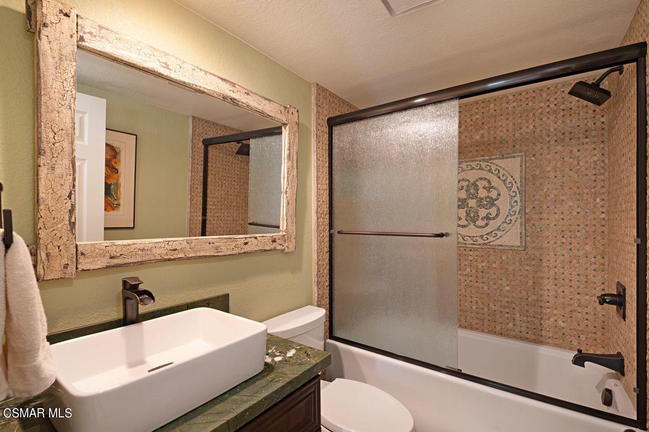 777 Congressional Road Simi Valley, CA 93065 - Photo 6 of 26 a bathroom with a sink and a mirror