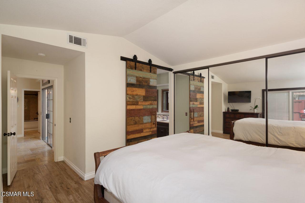 777 Congressional Road Simi Valley, CA 93065 - Photo 8 of 26 a bedroom with a large bed and a closet