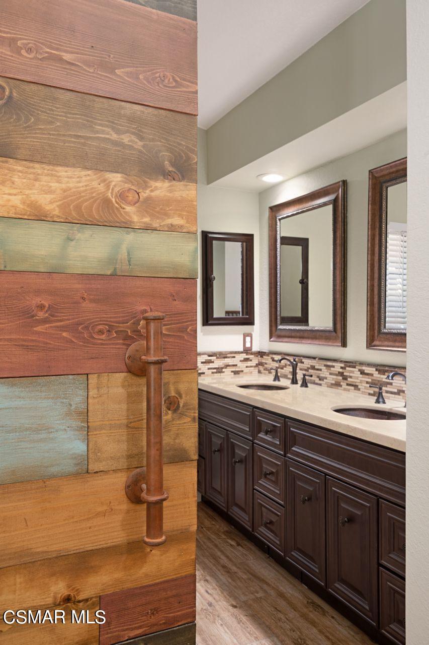 777 Congressional Road Simi Valley, CA 93065 - Photo 9 of 26 a bathroom with a sink and a mirror