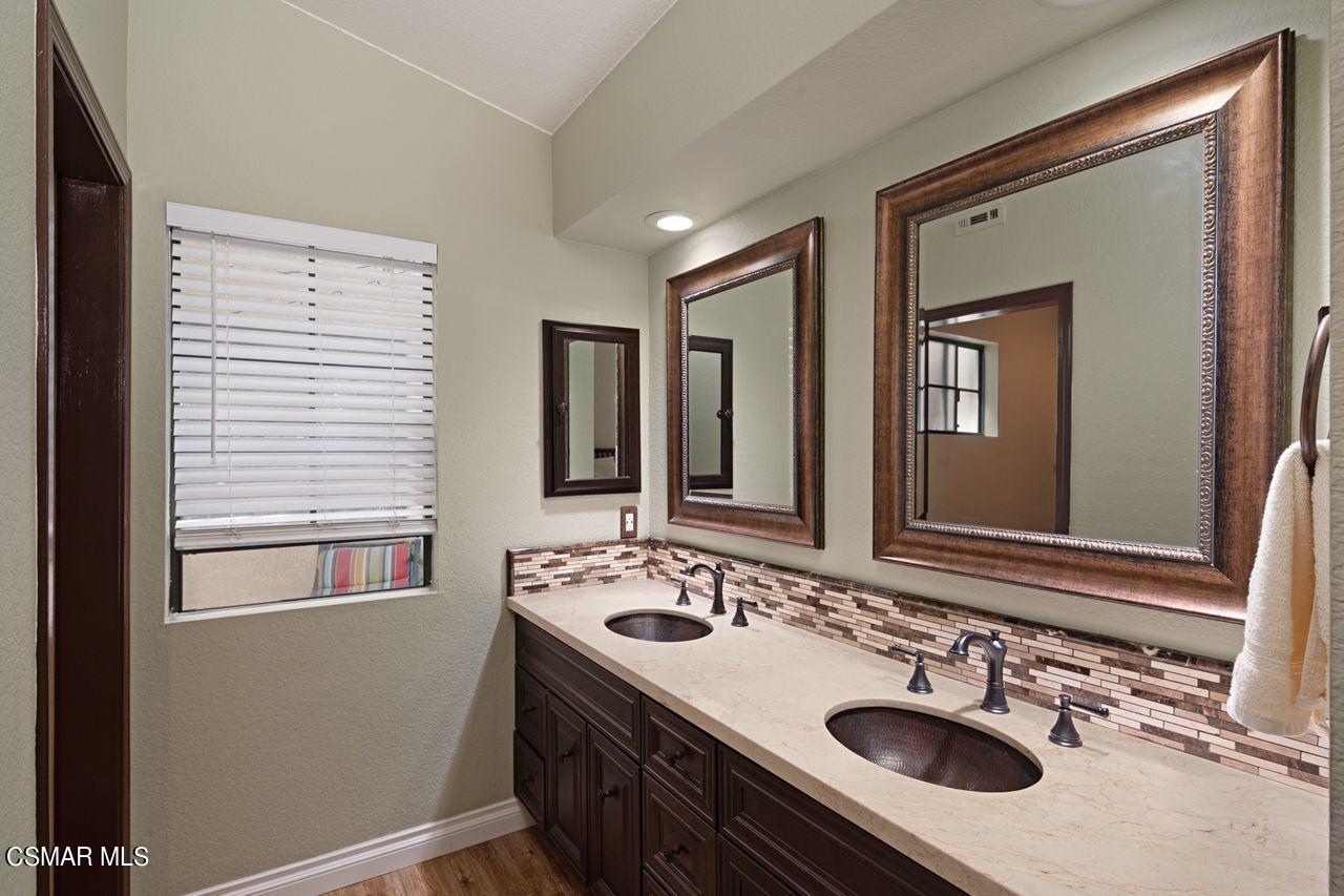 777 Congressional Road Simi Valley, CA 93065 - Photo 10 of 26 a bathroom with a sink double vanity and a mirror