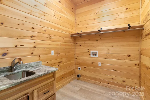 a view of a sink and dishwasher