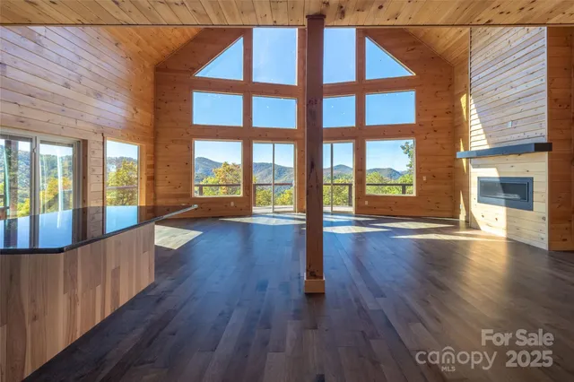 a view of an entryway with wooden floor