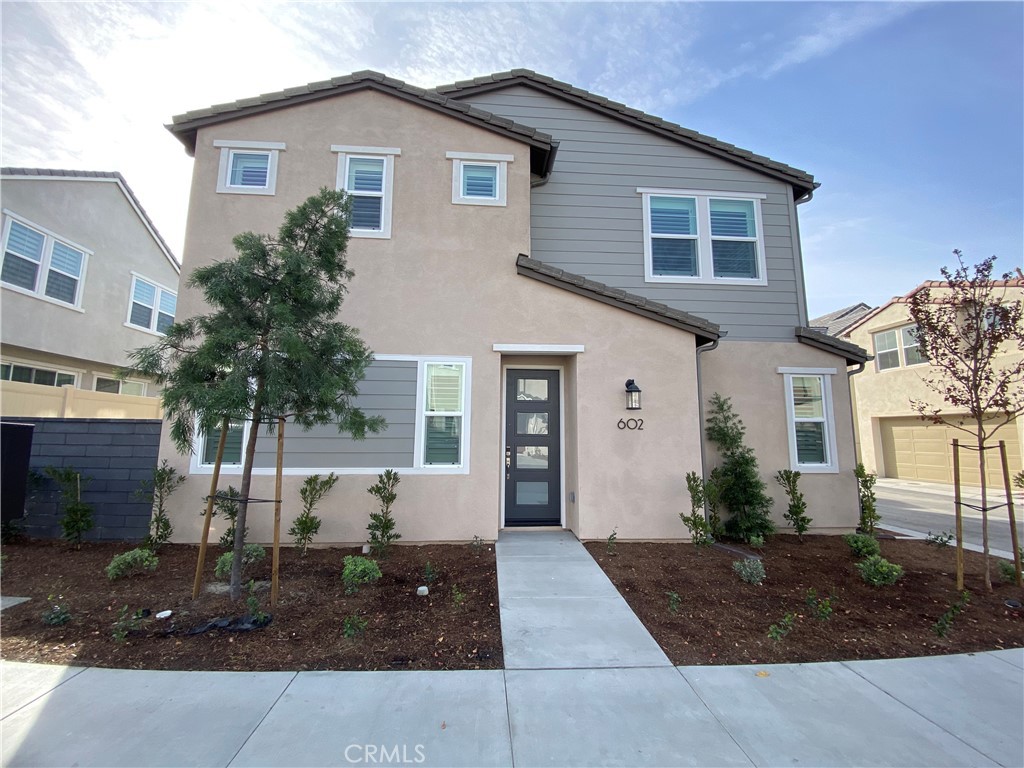 a view of a house with patio