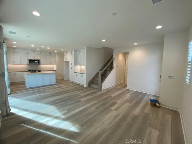 a view of a kitchen with a sink