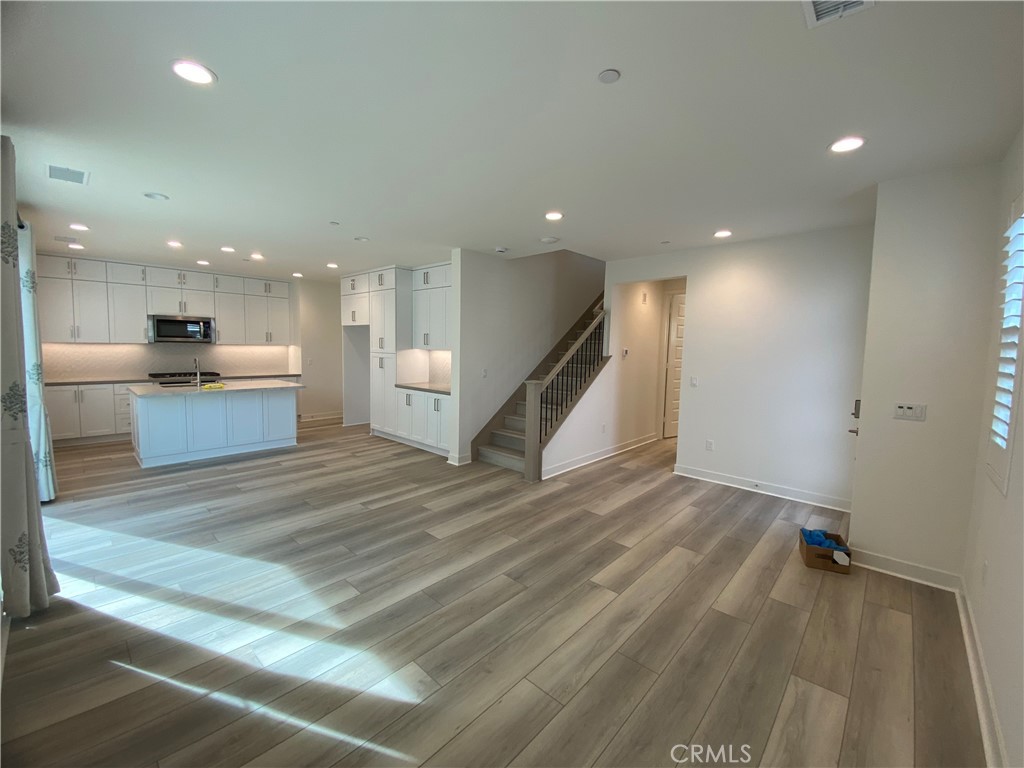602 Jasper Street Rancho Mission Viejo, CA 92694 - Photo 4 of 18 a view of a kitchen with a sink