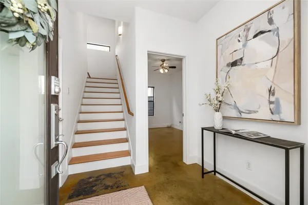 a view of an entryway with staircase