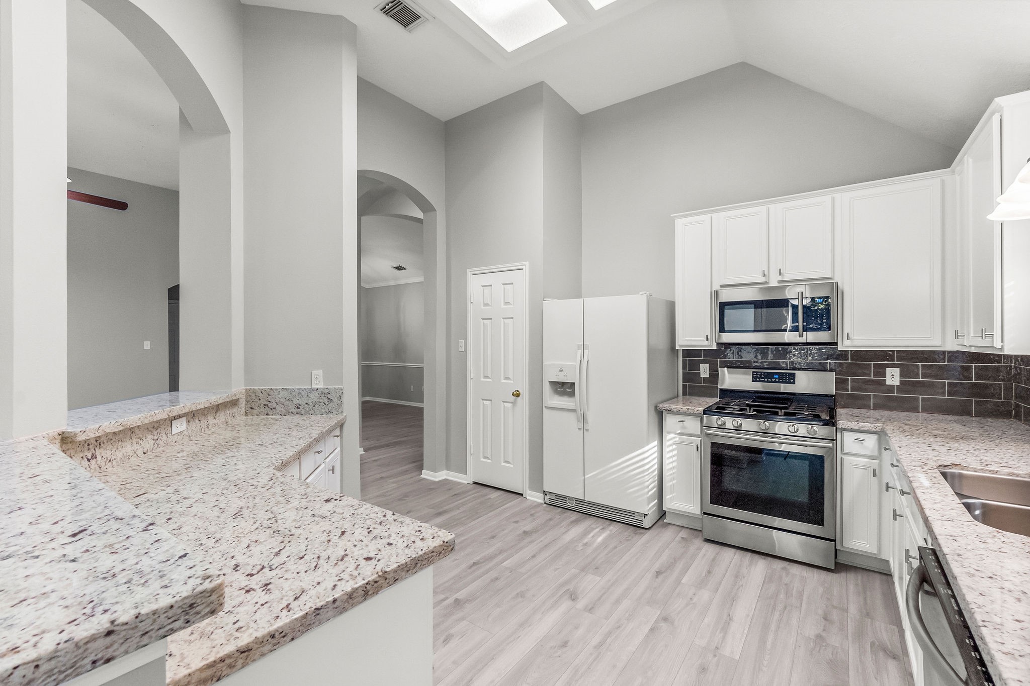 155 North Wimberly Way Conroe, TX 77385 - Photo 14 of 43 The refrigerator has been replaced with a new stainless steel refrigerator