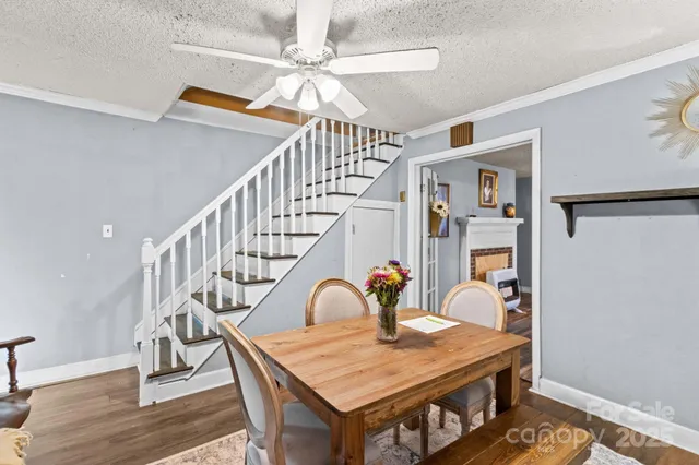 a view of an entryway and wooden floor