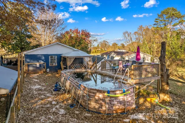 a view of a house with swimming pool