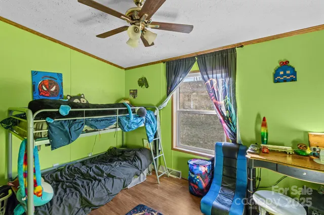 a bedroom with furniture and a bed