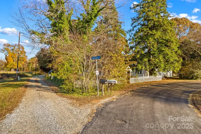 a view of a yard with an trees