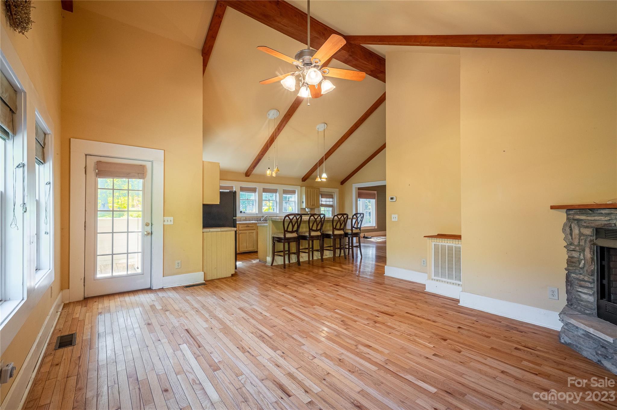611 Vinearden Road Morganton, NC 28655 - Photo 12 of 32 a view of a livingroom with furniture and a ceiling fan