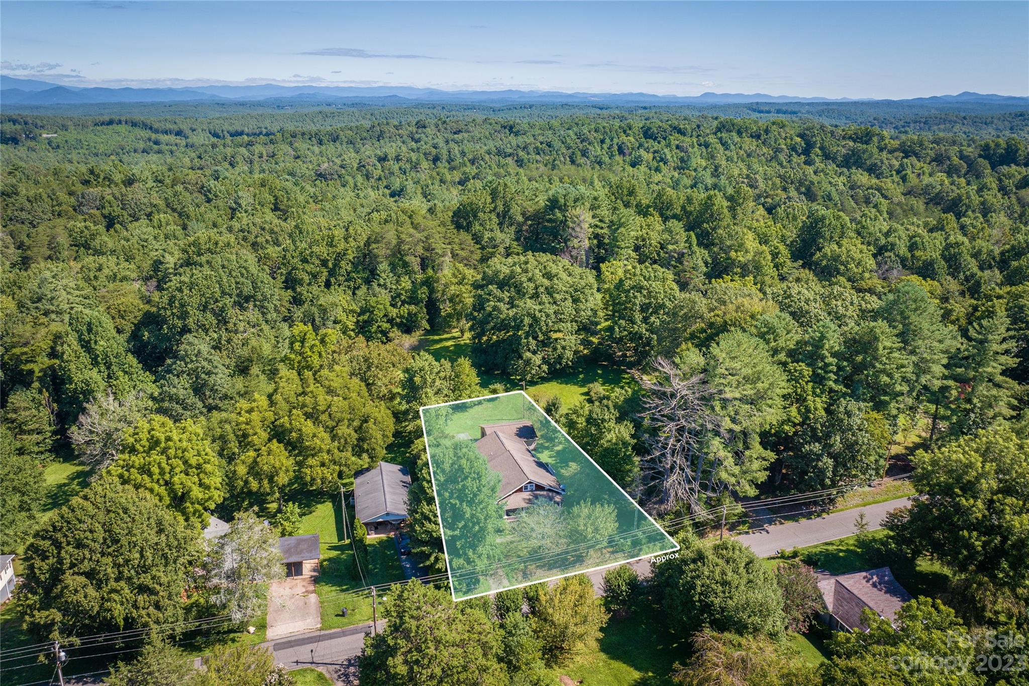 611 Vinearden Road Morganton, NC 28655 - Photo 25 of 32 an aerial view of a house with a yard