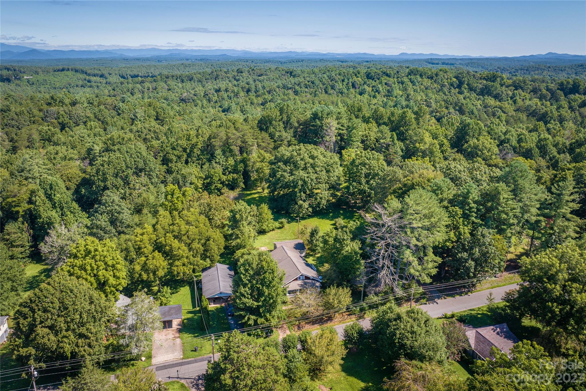 611 Vinearden Road Morganton, NC 28655 - Photo 27 of 32 an aerial view of a house with a yard