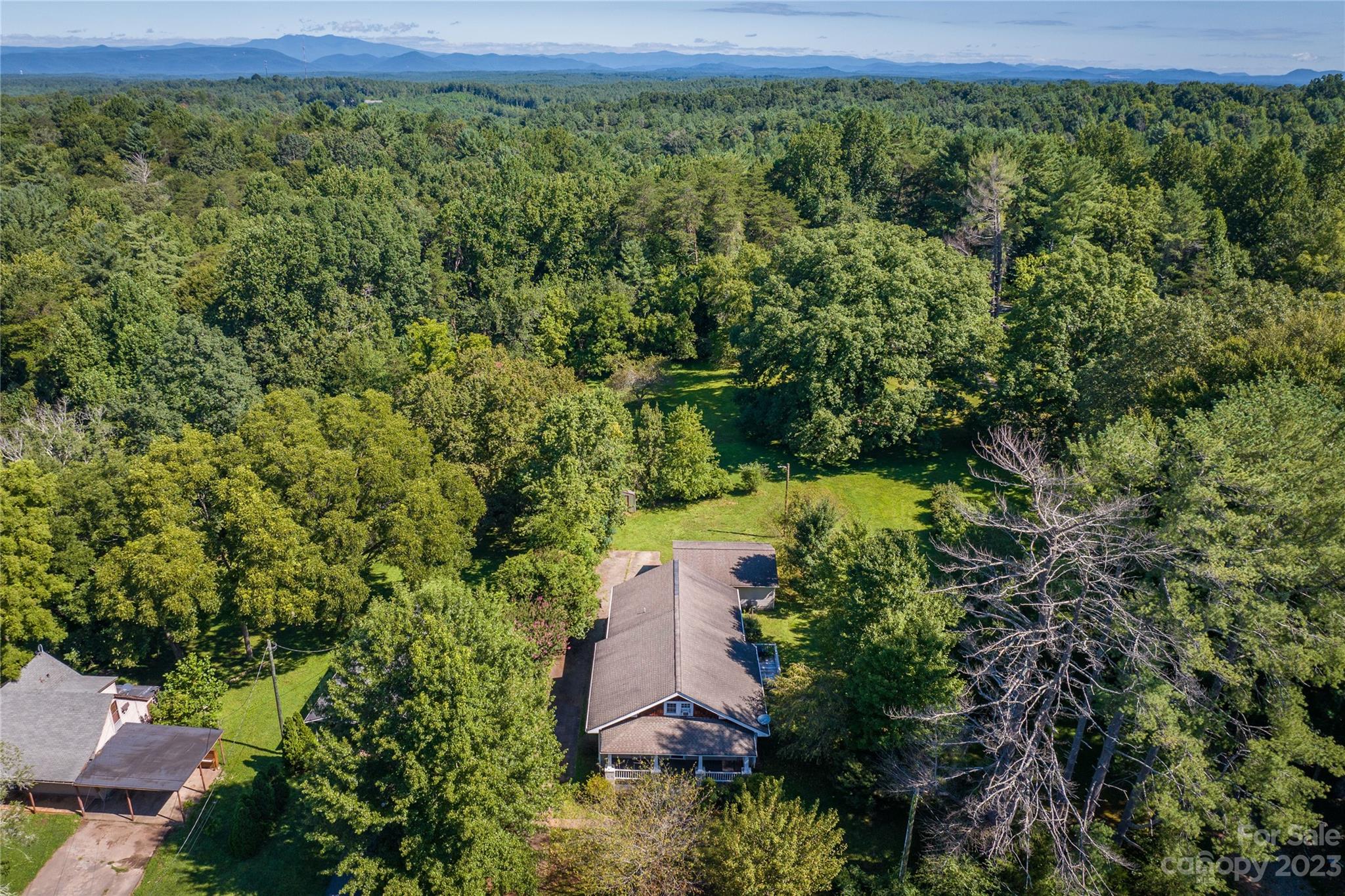 611 Vinearden Road Morganton, NC 28655 - Photo 31 of 32 an aerial view of a house with a yard
