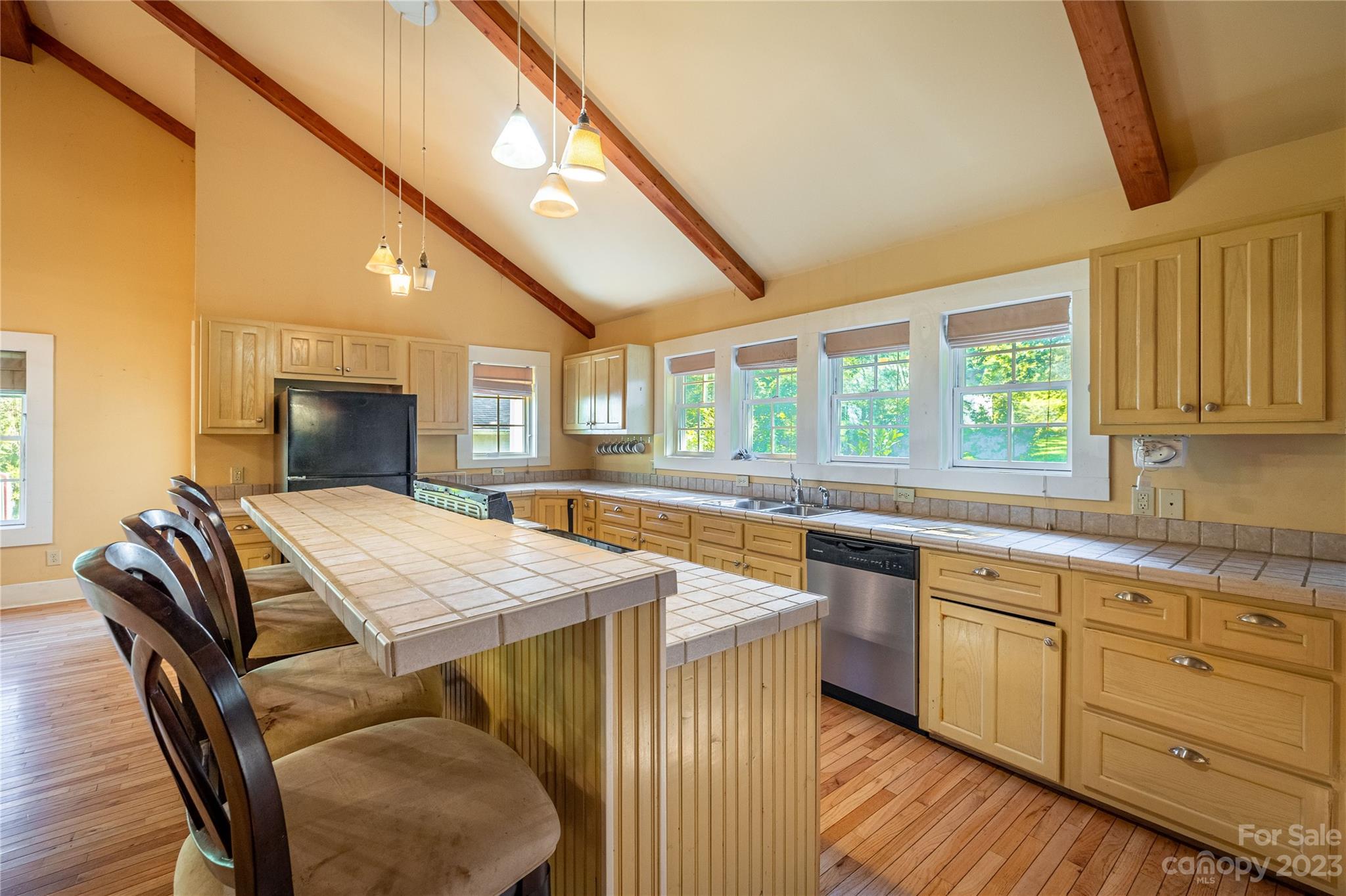 611 Vinearden Road Morganton, NC 28655 - Photo 10 of 32 a dining hall with stainless steel appliances granite countertop a stove and a sink