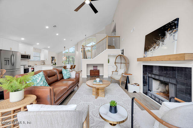 2191 Birch Bark Drive Jacksonville, FL 32246 - Photo 14 of 49 a living room with furniture and a fireplace