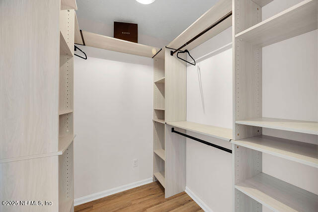 2191 Birch Bark Drive Jacksonville, FL 32246 - Photo 27 of 49 a view of walk in closet with clothes and shoes