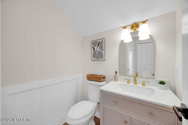 2191 Birch Bark Drive Jacksonville, FL 32246 - Photo 31 of 49 a bathroom with a sink a toilet and mirror