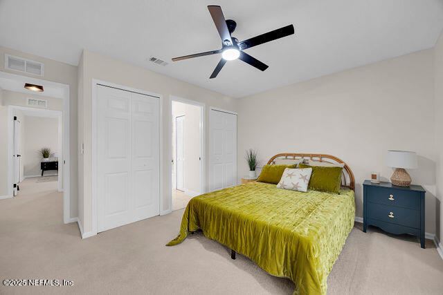 2191 Birch Bark Drive Jacksonville, FL 32246 - Photo 42 of 49 a bedroom with a bed and a ceiling fan