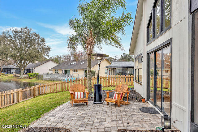 2191 Birch Bark Drive Jacksonville, FL 32246 - Photo 47 of 49 a view of a house with backyard outdoor seating area and barbeque oven