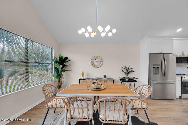 2191 Birch Bark Drive Jacksonville, FL 32246 - Photo 9 of 49 a view of a dining room with furniture window and outside view
