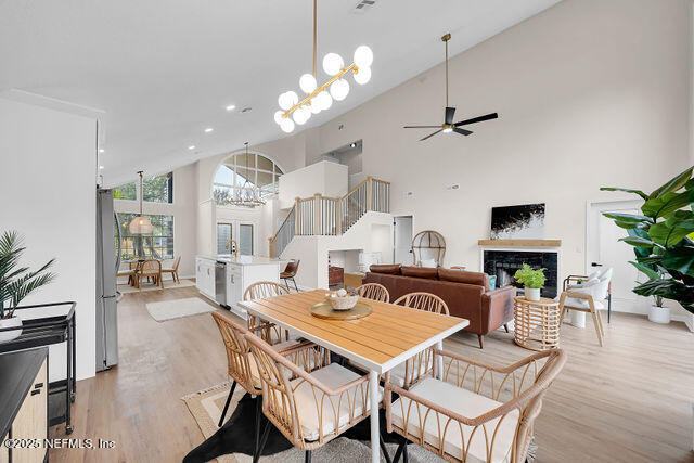 2191 Birch Bark Drive Jacksonville, FL 32246 - Photo 10 of 49 a view of a dining room with furniture and wooden floor