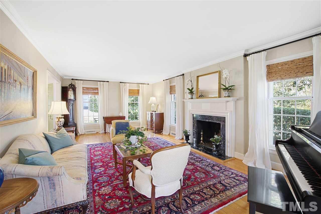 2000 Lewis Circle Raleigh, NC 27608 - Photo 5 of 30 a living room with furniture fireplace and window