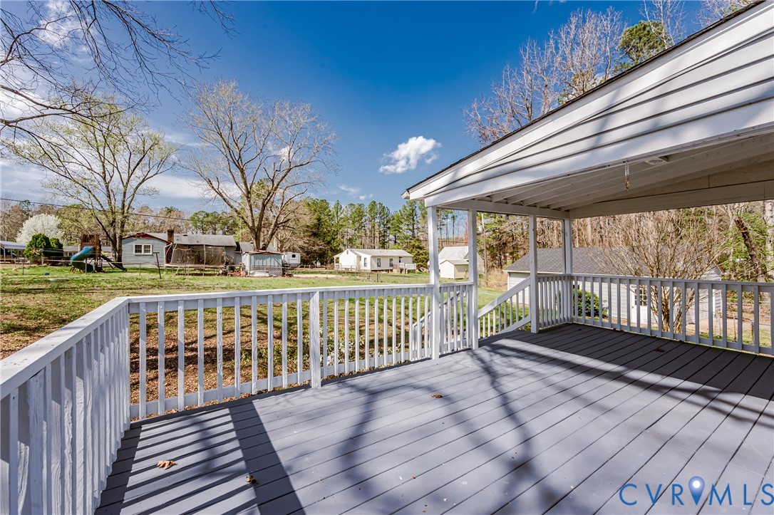15412 Exter Mill Road Chesterfield, VA 23838 - Photo 20 of 60 Deck with a residential view and a lawn